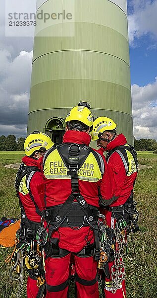 Height rescuers from the Gelsenkirchen fire brigade practise abseiling from a wind turbine from a height of 110 metres after rescuing an accident victim from the nacelle  Gladbeck  North Rhine-Westphalia  Germany  Europe