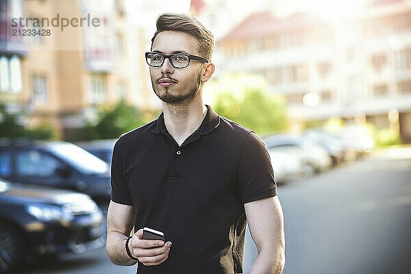 Portrait of handsome caucasian man st street