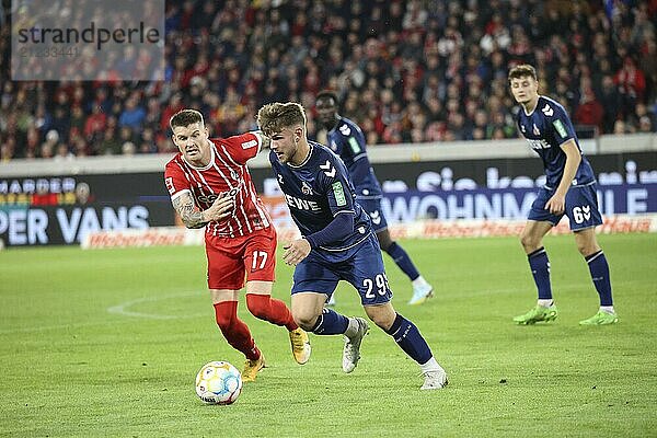 Laufduell vs# Lukas Kübler (Freiburg) und Jan Thielmann (1. FC Köln) beim Spiel der 1. FBL: 22-23: 13. Sptg. SC Freiburg  1. FC Köln DFL REGULATIONS PROHIBIT ANY USE OF PHOTOGRAPHS AS IMAGE SEQUENCES AND/OR QUASI-VIDEONann Foto: Joachim Hahne/johapress