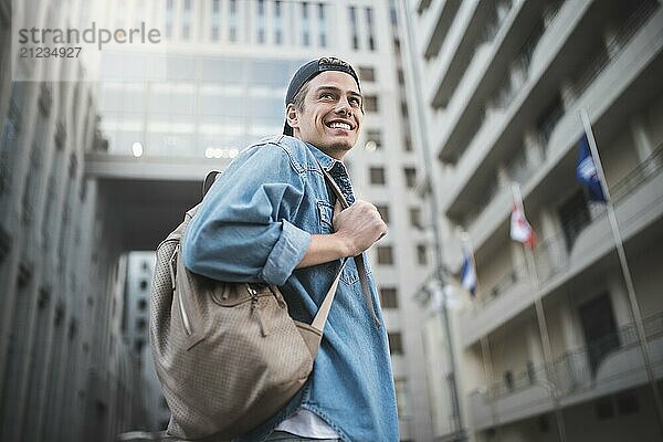 Background on the street while waiting his colleagues. Businessman wearing casual white shirt and spectacles. People