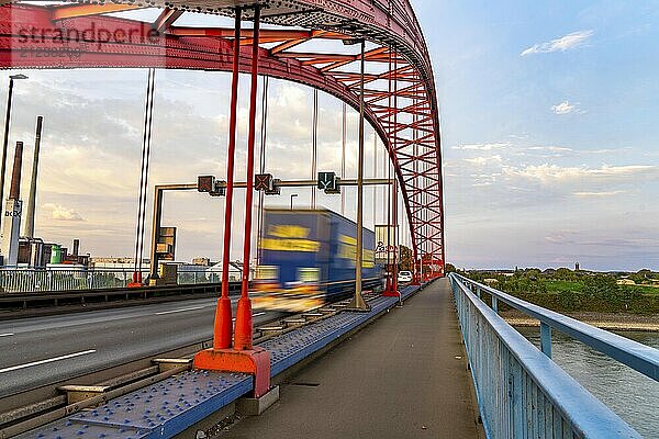 The Bridge of Solidarity  the longest tied-arch bridge in Germany  over the Rhine from Duisburg-Hochfeld to DU-Rheinhausen  the road bridge is dilapidated and has to be rebuilt  many thousands of lorries from the Logport port and cars use the bridge every day  new construction by 2040  Duisburg  North Rhine-Westphalia  Germany  Europe