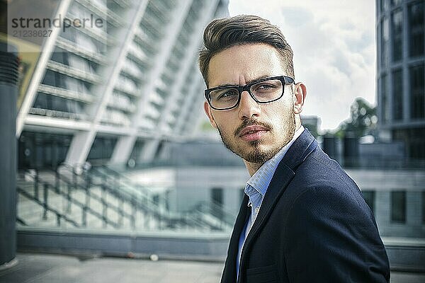 Happy businessman stand on stairs and dreaming about something