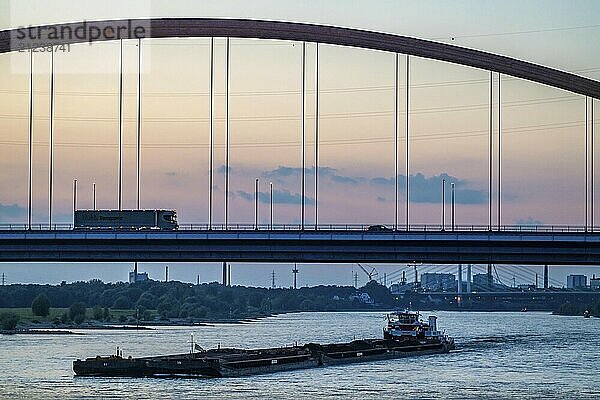 The Bridge of Solidarity  the longest tied-arch bridge in Germany  over the Rhine from Duisburg-Hochfeld to DU-Rheinhausen  the road bridge is dilapidated and has to be rebuilt  many thousands of lorries from the Logport port and cars use the bridge every day  new construction by 2040  cargo ships  Duisburg  North Rhine-Westphalia  Germany  Europe