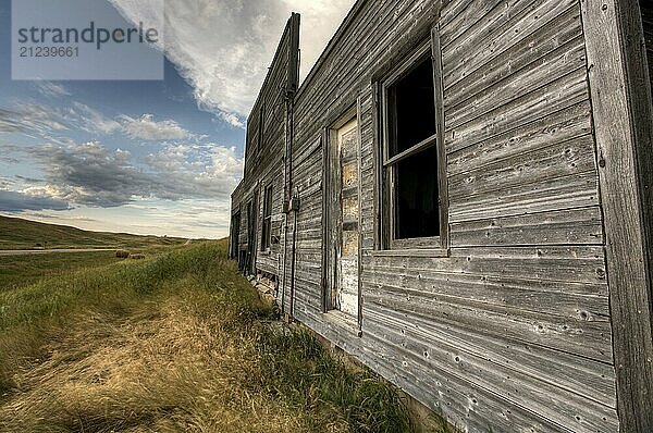 Abandoned Farmhouse Saskatchewan Canada sunset and prairie view