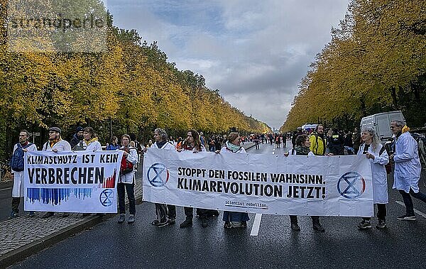 Germany  Berlin  28.10.2023  Climate activists protest with mass occupation  Climate activists demonstrated on Saturday (28.10.2023) for a phase-out of fossil fuels with a mass occupation of Strasse des 17. According to the police  several hundred people took part in the protests at the Victory Column  some of whom blocked the street while sitting down. The police explained that it was forbidden to stick to the road. The protest was organised by the Last Generation initiative. The protests  modelled on those in the Netherlands  were intended to express the demand for an end to subsidies for fossil fuels  Europe