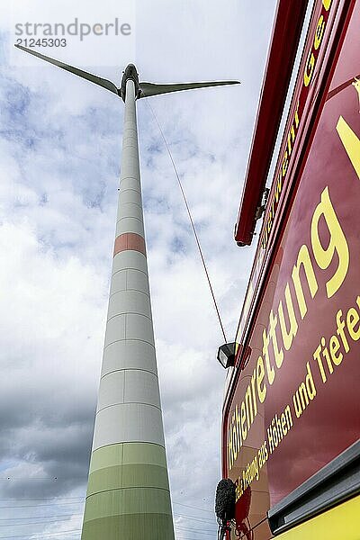 Height rescuers from the Gelsenkirchen fire brigade practise abseiling from a wind turbine from a height of 110 metres after rescuing an accident victim from the nacelle  Gladbeck  North Rhine-Westphalia  Germany  Europe