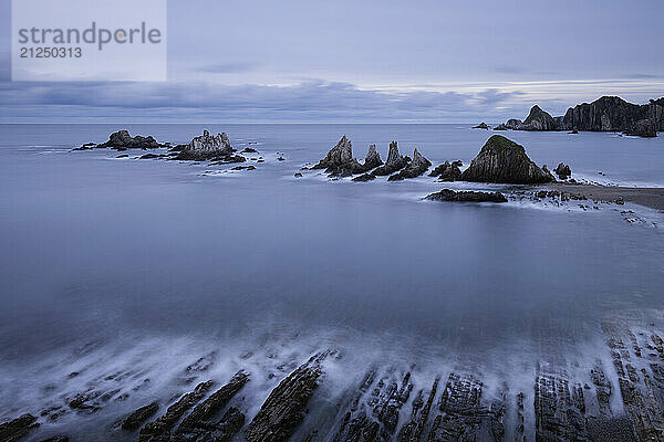 Rock formations at Playa de Gueirua beach  Asturias  Spain