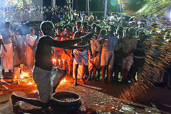 Theyyam ritual performed in the area of Kannur  Kerala  India.