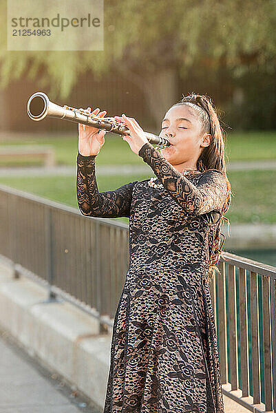 Young girl playing the Clarinet