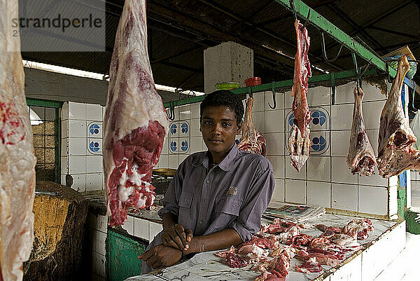 Meat seller on Hai el-Arab Souq in Omdurman  Sudan.