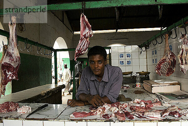 Meat seller on Hai el-Arab Souq in Omdurman  Sudan.