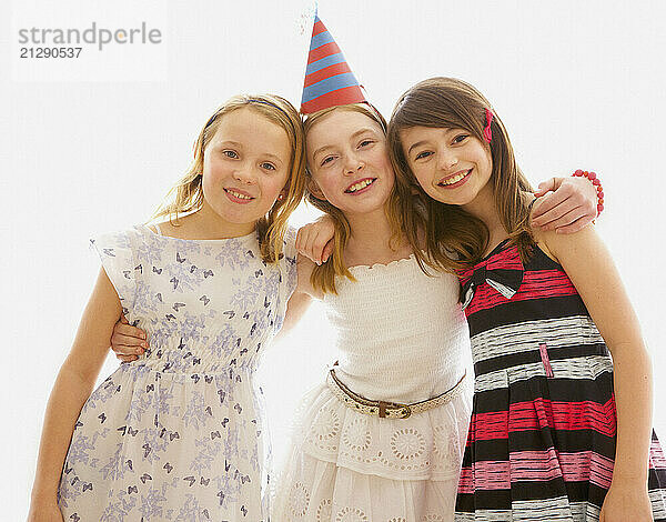 Portrait of Three Young Girls at Party