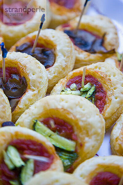 Close up of assorted mini pizzas