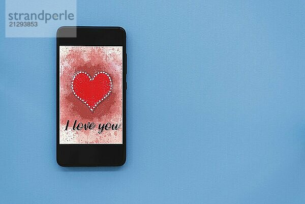 Valentines day sale background with heart illustration with the words I Love You on smartphone screen mockup on blue background. View from above  flat lay