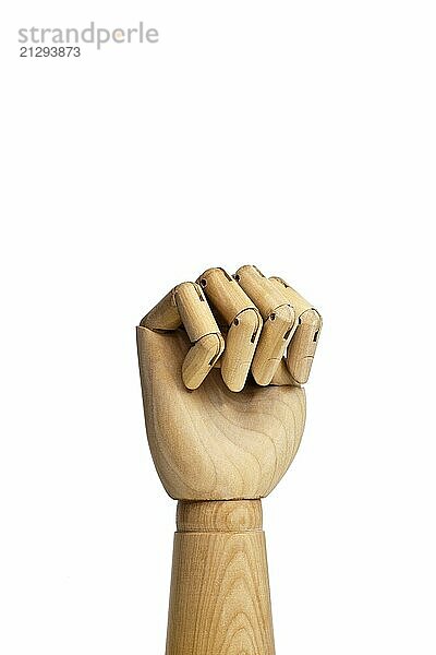 Artificial hand made of wood  in front of a white background