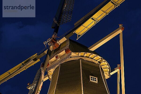 Authentic renovated windmill in Winterswijk in the east of the Netherlands in special illumination