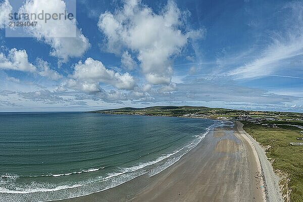 An aerial panorama view of the Bray Head cliffs and headland on Valentia Island at sunset aerial view of the endless golden sand beach in Ballybunion on the west coast of Ireland