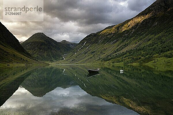 Evening view at Lake Anestolsvatnet which is surrounded by beautiful mountains and is situated close to the Norwegian village Sogndal