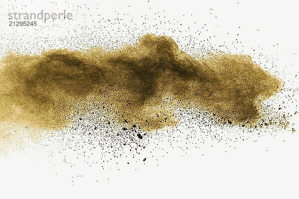 Abstract deep brown dust explosion on white background. Freeze motion of coffee liked color dust splash