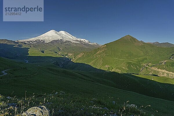 Beautiful view of Mount Elbrus at sunrise  North Caucasus mountains  Russia  Europe