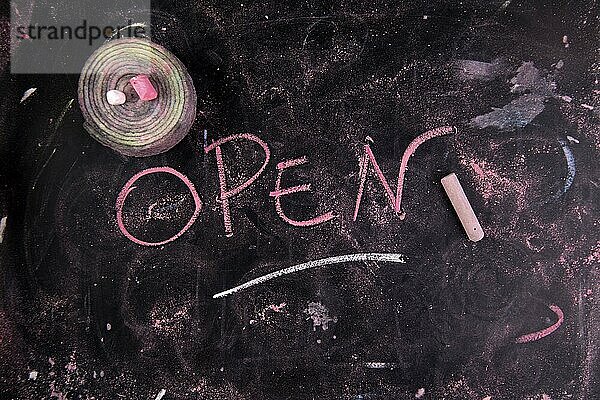 Written graphic opening  with colorful chalk on blackboard