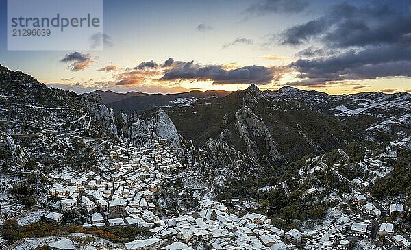 Drone view of Castelmezzano in the Piccolo Dolomiti region of southern Italy at sunrise in winter