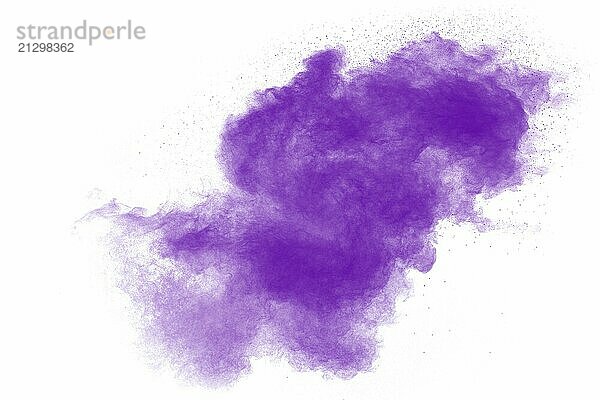 Purple particles explosion on white background.Freeze motion of purple dust splash on background