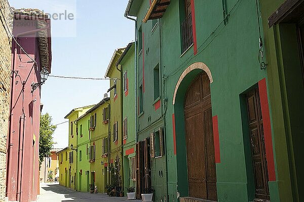 Photographic documentation of the colored houses in Ghizzano Pisa Italy