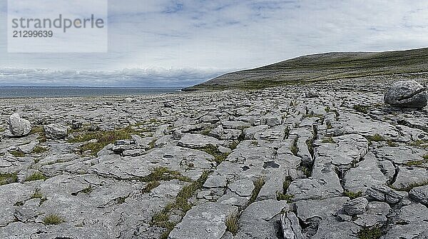 A panorama view of the glaciokarst coastal landscape of the Burren Coast in County Clare of western Ireland