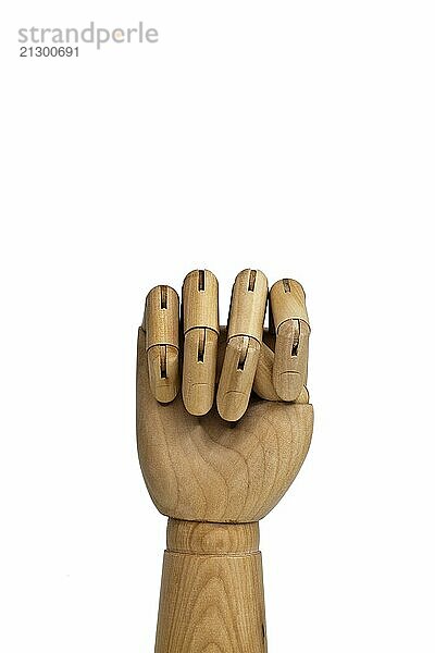 Artificial hand made of wood  in front of a white background