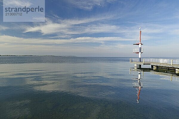 View of calm sea with jetty and cloudy sky  peaceful atmosphere  Rechlin  Müritz  Mecklenburg-Vorpommern  Germany  Europe