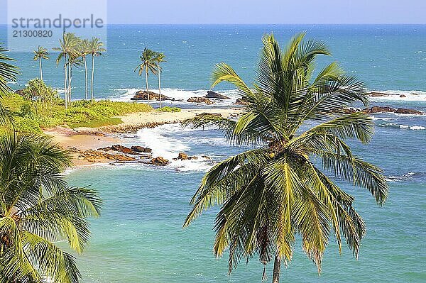 Beautiful tropical beach landscape with turquoise sea and clouds