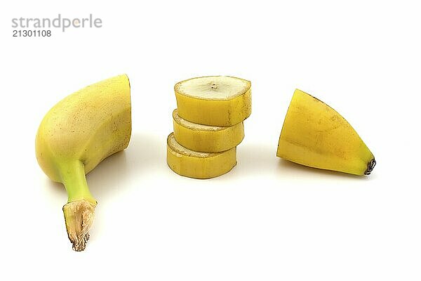 Banana cut into pieces isolated on white background close up