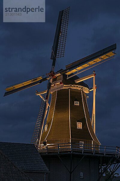 Authentic renovated windmill in Winterswijk in the east of the Netherlands in special illumination