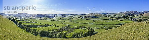 A Panorama Of Rolling Hills In The Scottish Borders On A Beautiful Summer's Day