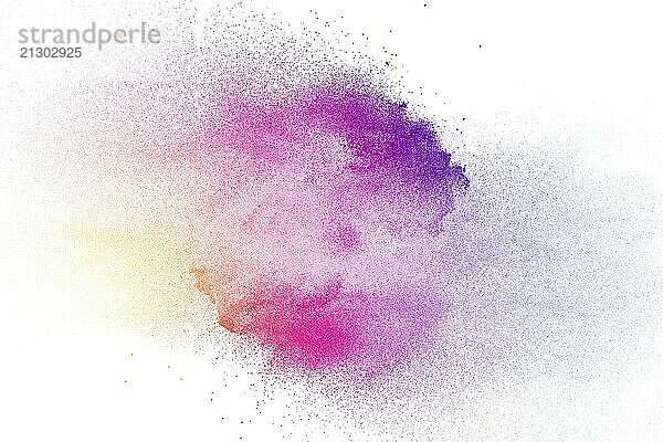 Multi color powder explosion on white background. Purple pink yellow dust splash