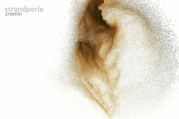 Golden sand explosion isolated on white background. Abstract sand cloud. Gold sand splash against on clear background. Sandy fly wave in the air