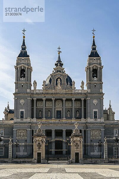 Beautiful view of Cathedral of La Almudena in Madrid on bright blue sky