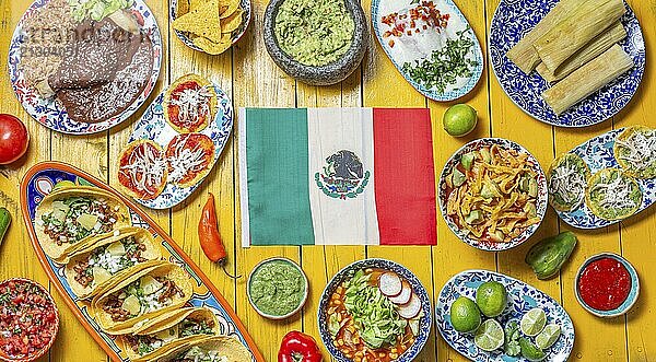 Food  Mexican festive food for independence day independencia  around mexican flag. Top view  Yellow background