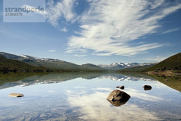 Beautiful reflection lake Sjodalsvatnet in the Norwegian region Valdres