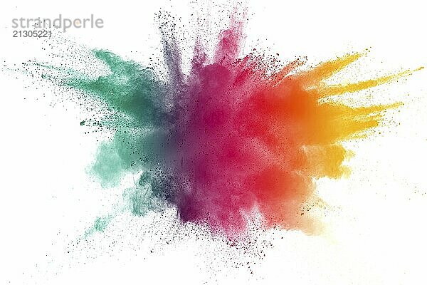 Multicolored powder explosion on white background. Yellow green and red color dust splashing