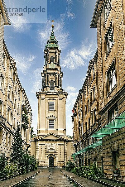 Berlin  Germany  July 29  2019: Beautiful view of Sophien Church at sunset against blue sky after rain  Europe