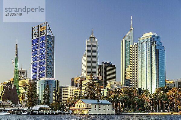 The floating clubhouse of West Australian Rowing Club at the feet of modern skyscrapers  Perth  WA  Australia  Oceania