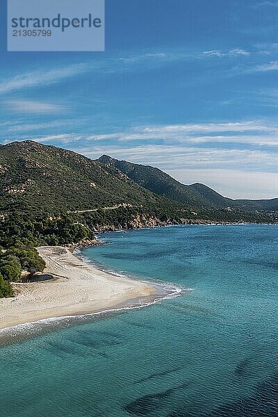 A vertical view of the beautiful white sand beach and turquoise waters at Turredda Beach in Sardinia