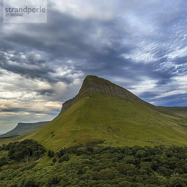 View of the sunset and overcast sky in the evening around Bunbeg table top mountain in County Sligo in western Ireland