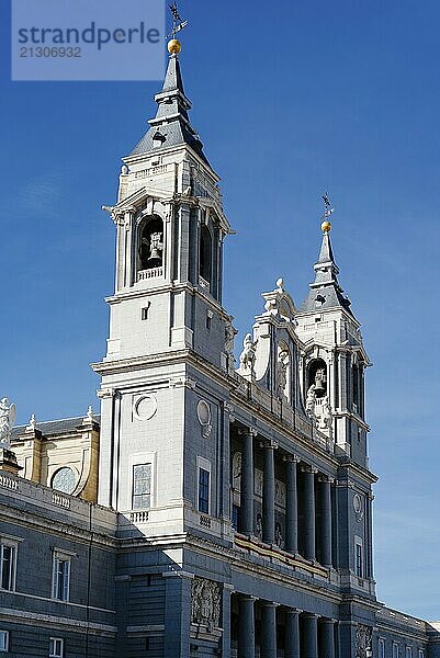 Beautiful view of Cathedral of La Almudena in Madrid on bright blue sky