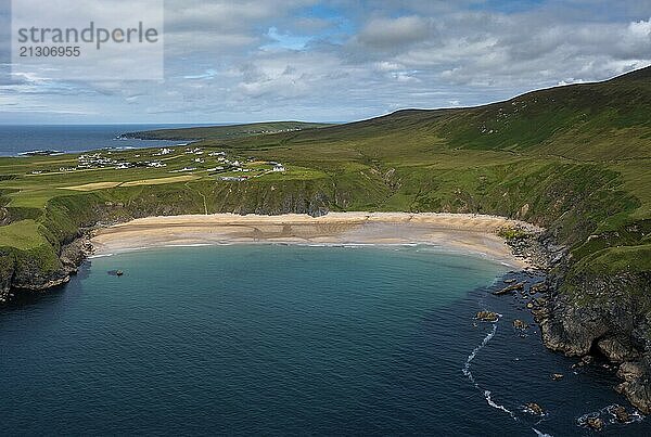 A drone aerial view of the beautiful Silver Strand and horseshoe bay at Malin Beg on the Wild Atlantic Way of Ireland