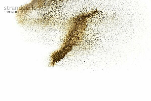 Dry river sand explosion. Golden colored sand splash against white background