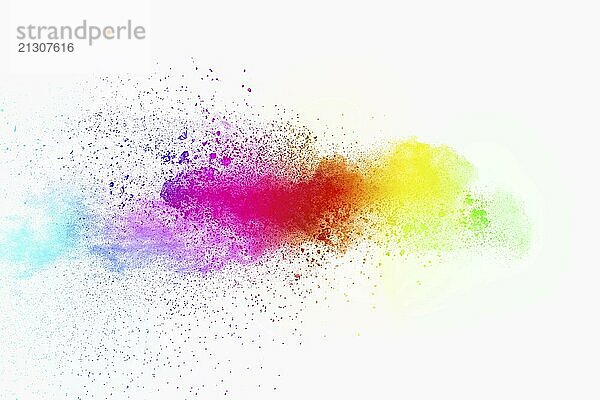 Colorful powder explosion on white background. Pastel color dust particle splashing