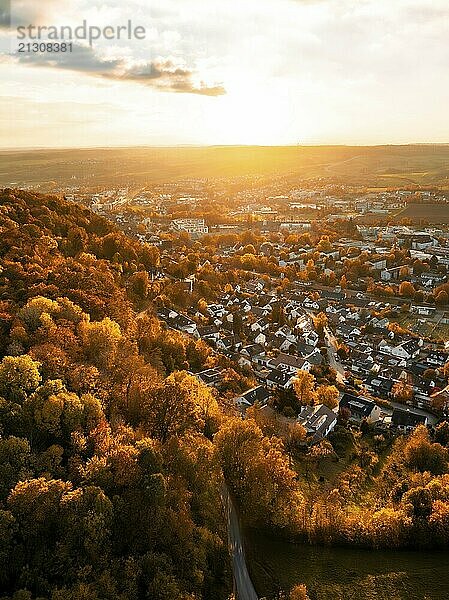 Autumnal cityscape in the evening light  wide view of houses and forests  Herrenberg  Germany  Europe